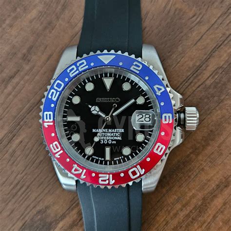 Lord Sugar sports the GMT 116719BLRO .